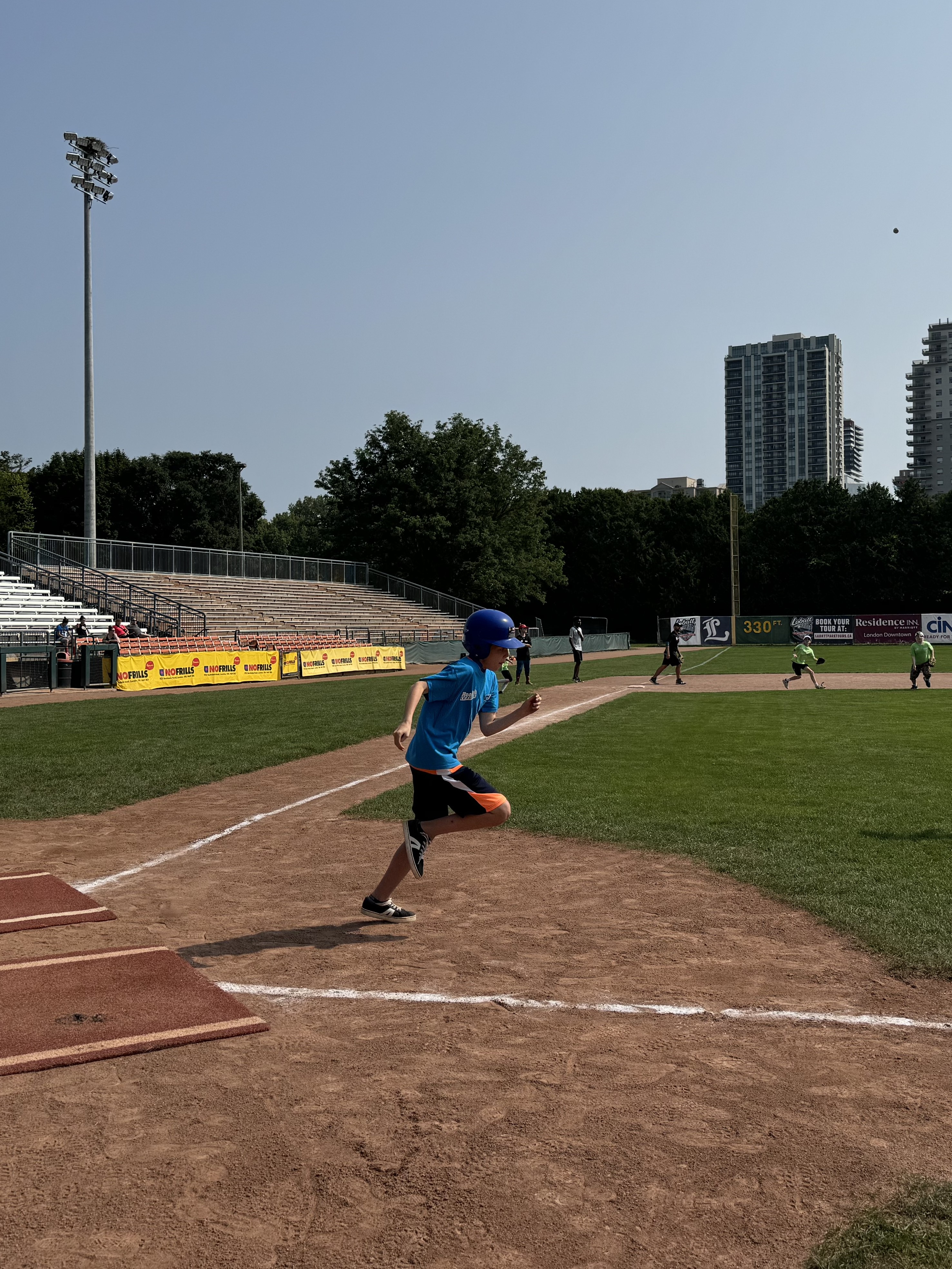 Baseball player running to first base